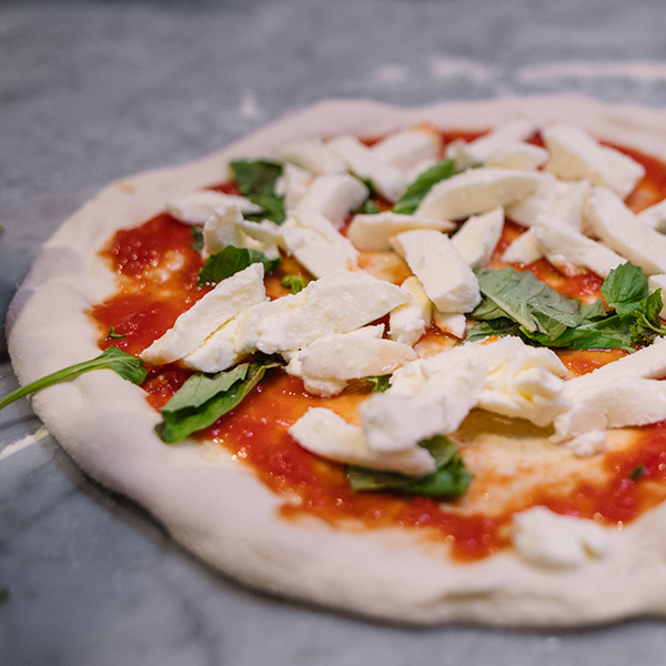 Neapolitan pizza featuring Grande fresh mozzarella cheese